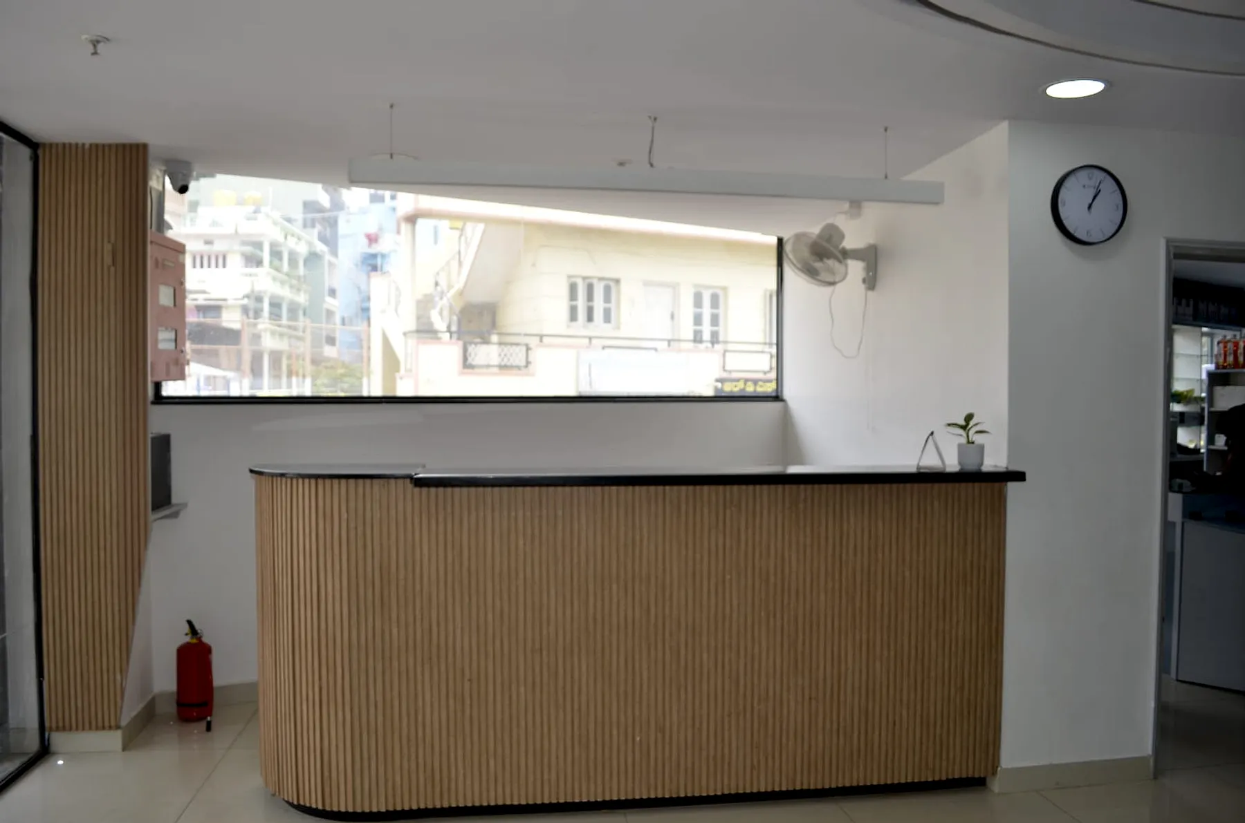 Reception desk with natural light at Lumi Hospital